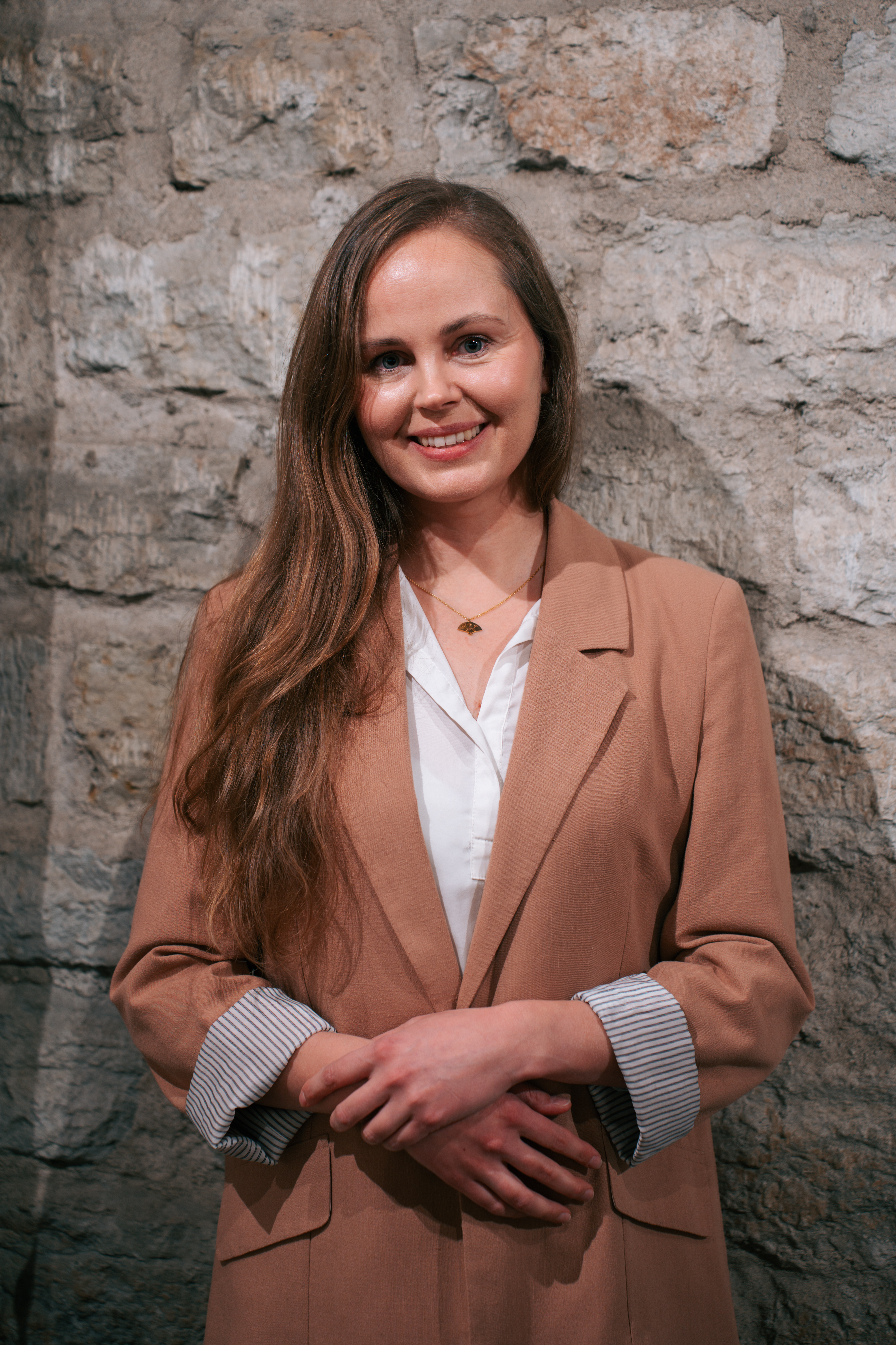 Portrait of Gerly Kullamaa, co-founder and CEO of Stay With My Pet